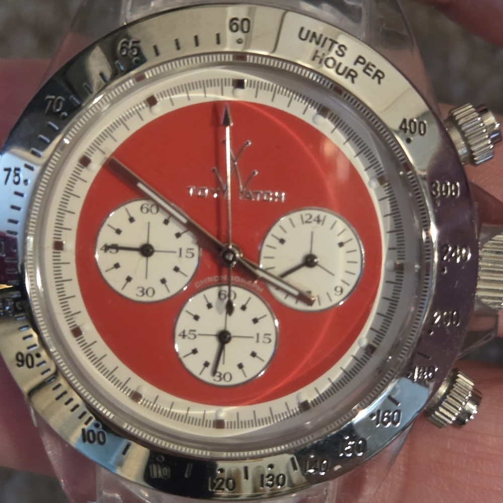 Like New Red And White "Toy Watch" With Clear Band. Needs Battery.
